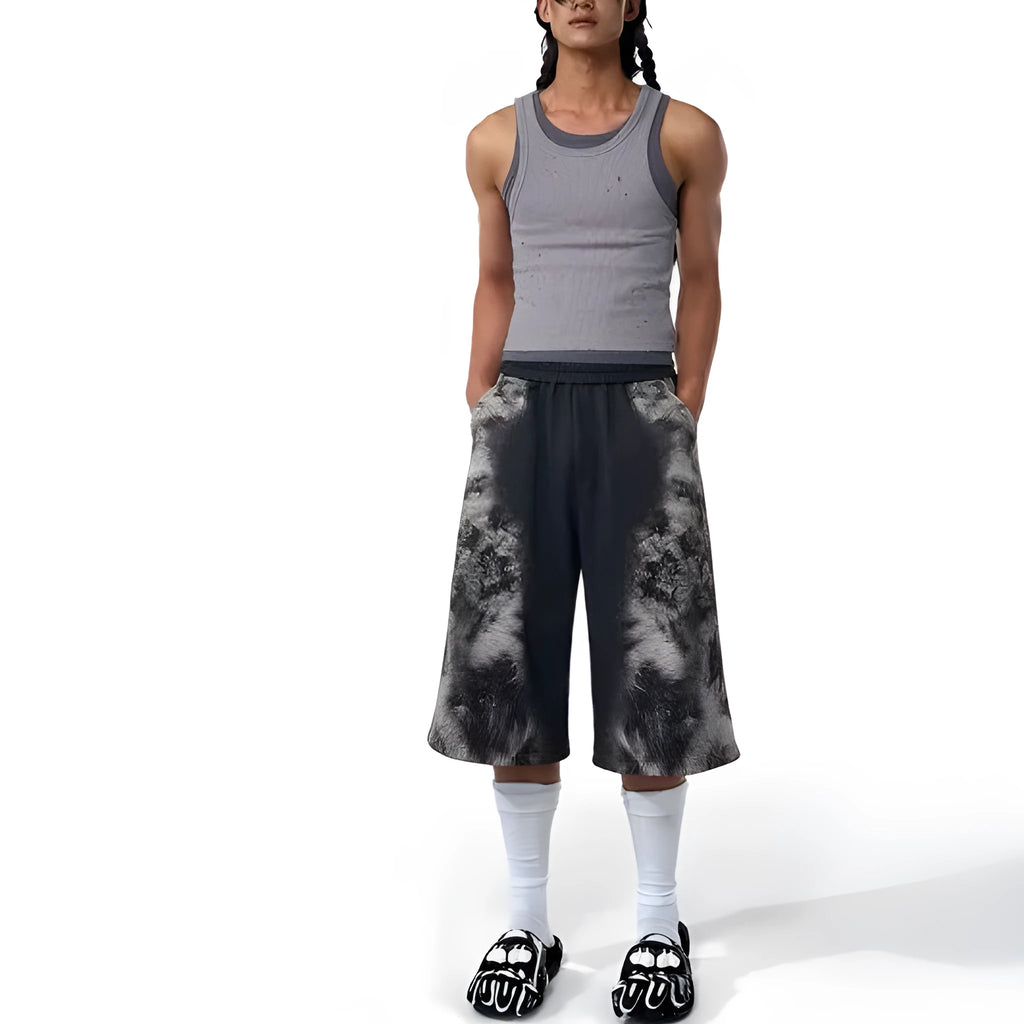 Loose fit printed street style trousers set with hoodie on a neutral background
