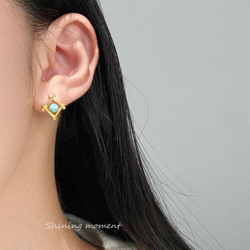 Women's geometric cross quadrangle stud earrings in 925 silver with gold and silver finish options