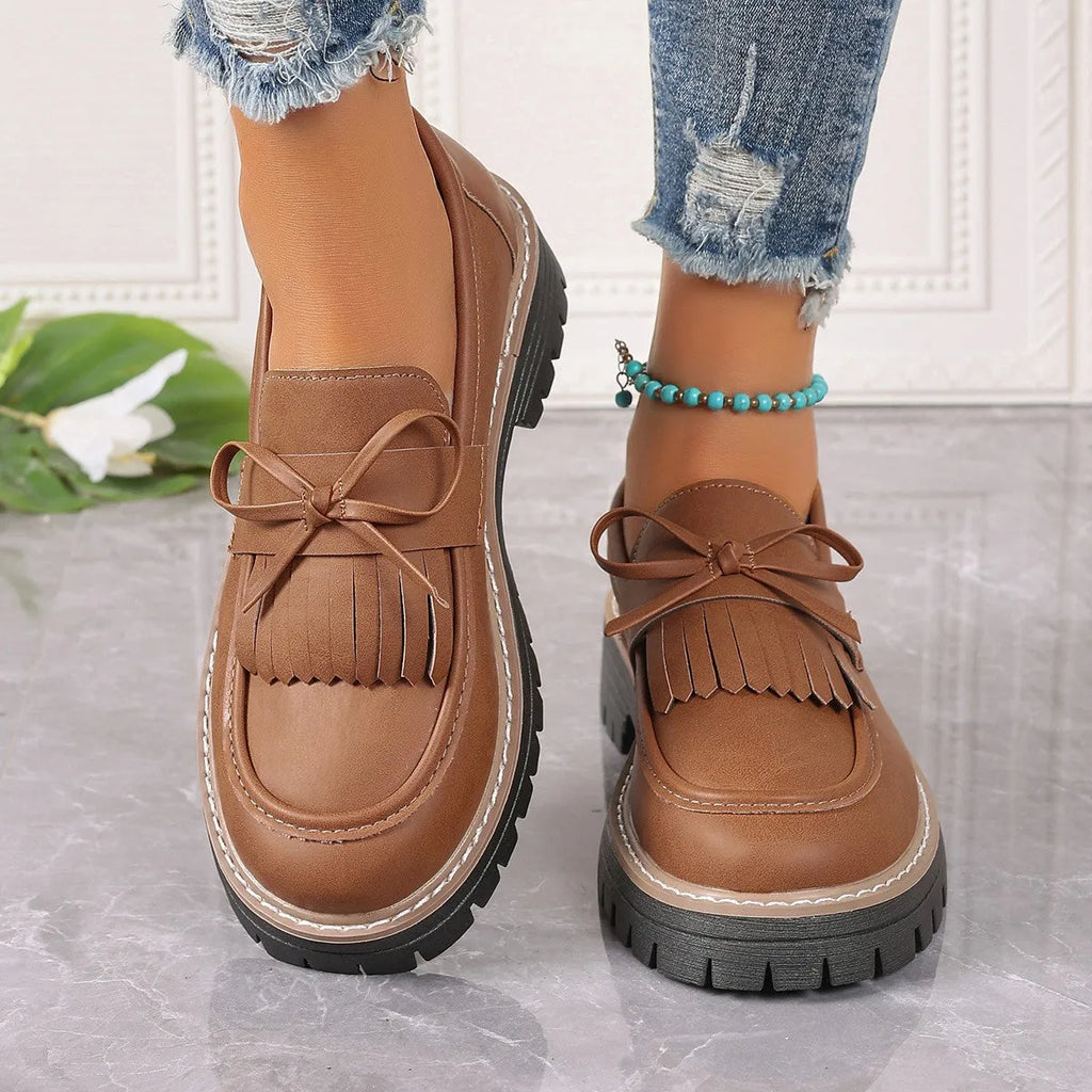 Black plus size women's loafers with tassel and bowknot decoration on round toe casual shoes