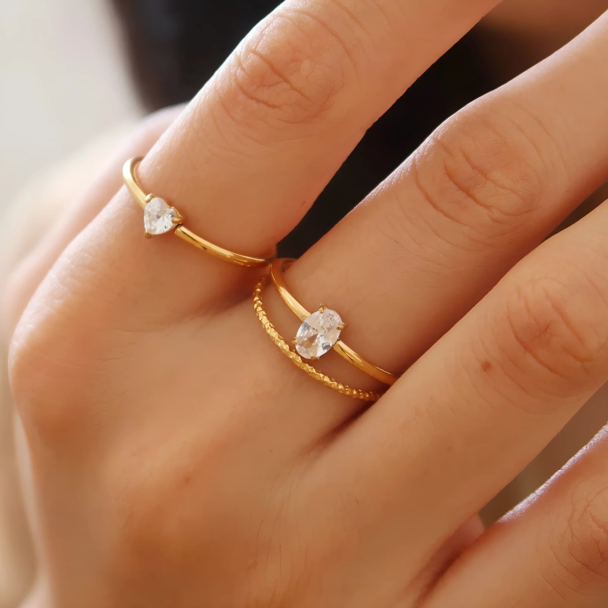 Golden electroplated stainless steel ring with love heart and oval designs for women