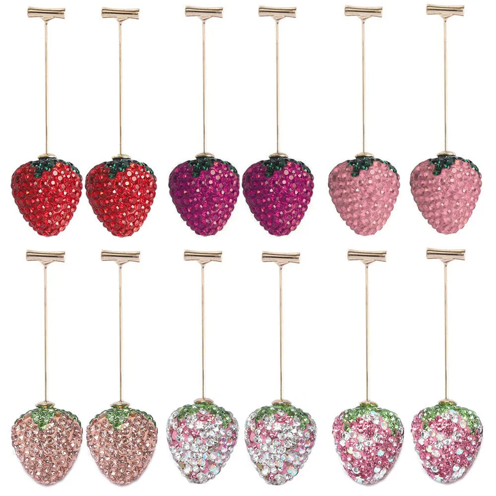 Red geometric strawberry stud earrings made from zinc alloy for women.