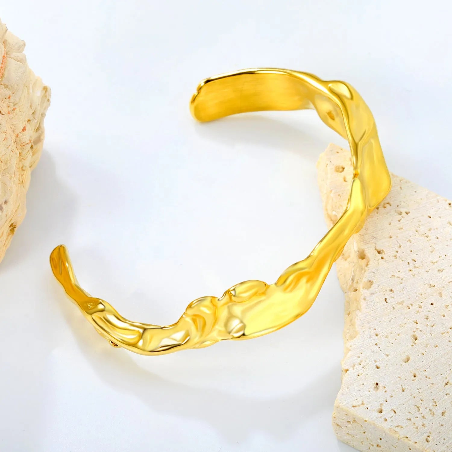 Adjustable stainless steel and alloy bracelet shown in gold-tone, silver-tone, and rose gold-tone colour options.