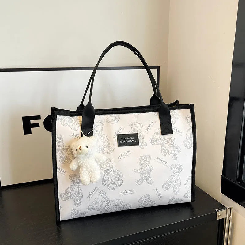 Women's printed canvas tote bag with sandwich pocket and horizontal square shape