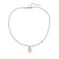 White conch shell mother-of-pearl pendant necklace on a silver electroplated chain for women.