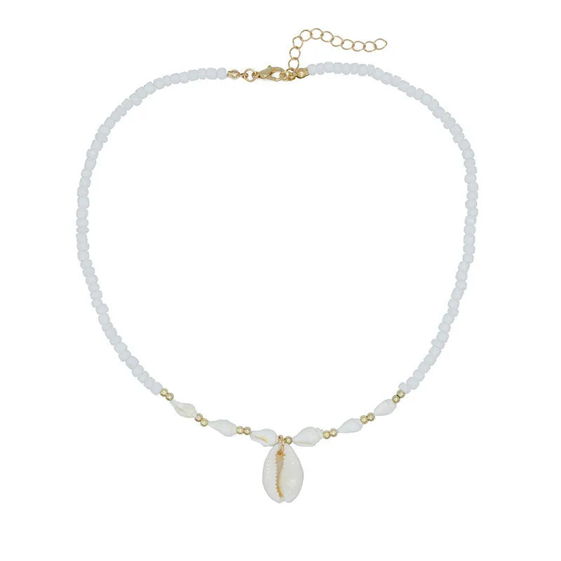 White conch shell mother-of-pearl pendant necklace on a silver electroplated chain for women.