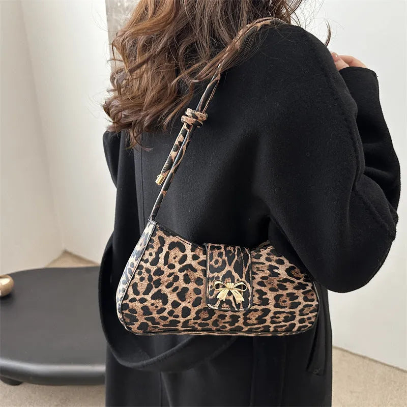 Women's casual PU leather shoulder bag in black with sandwich pocket, 27cm length