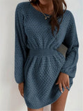 Blue women's knitted dress with crochet flower detail, round neck, and fitted waist