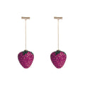 Red geometric strawberry stud earrings made from zinc alloy for women.