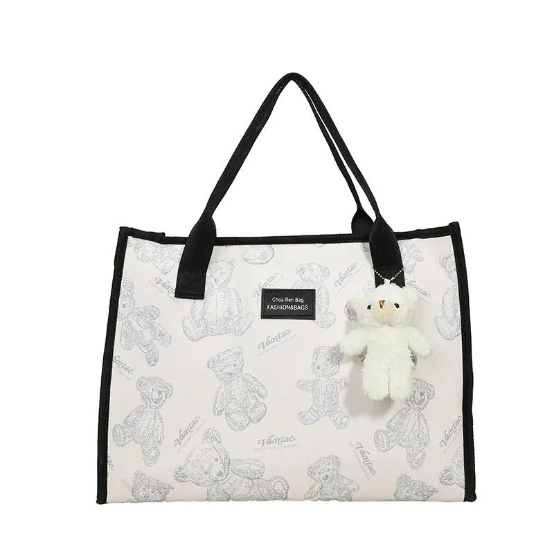 Women's printed canvas tote bag with sandwich pocket and horizontal square shape
