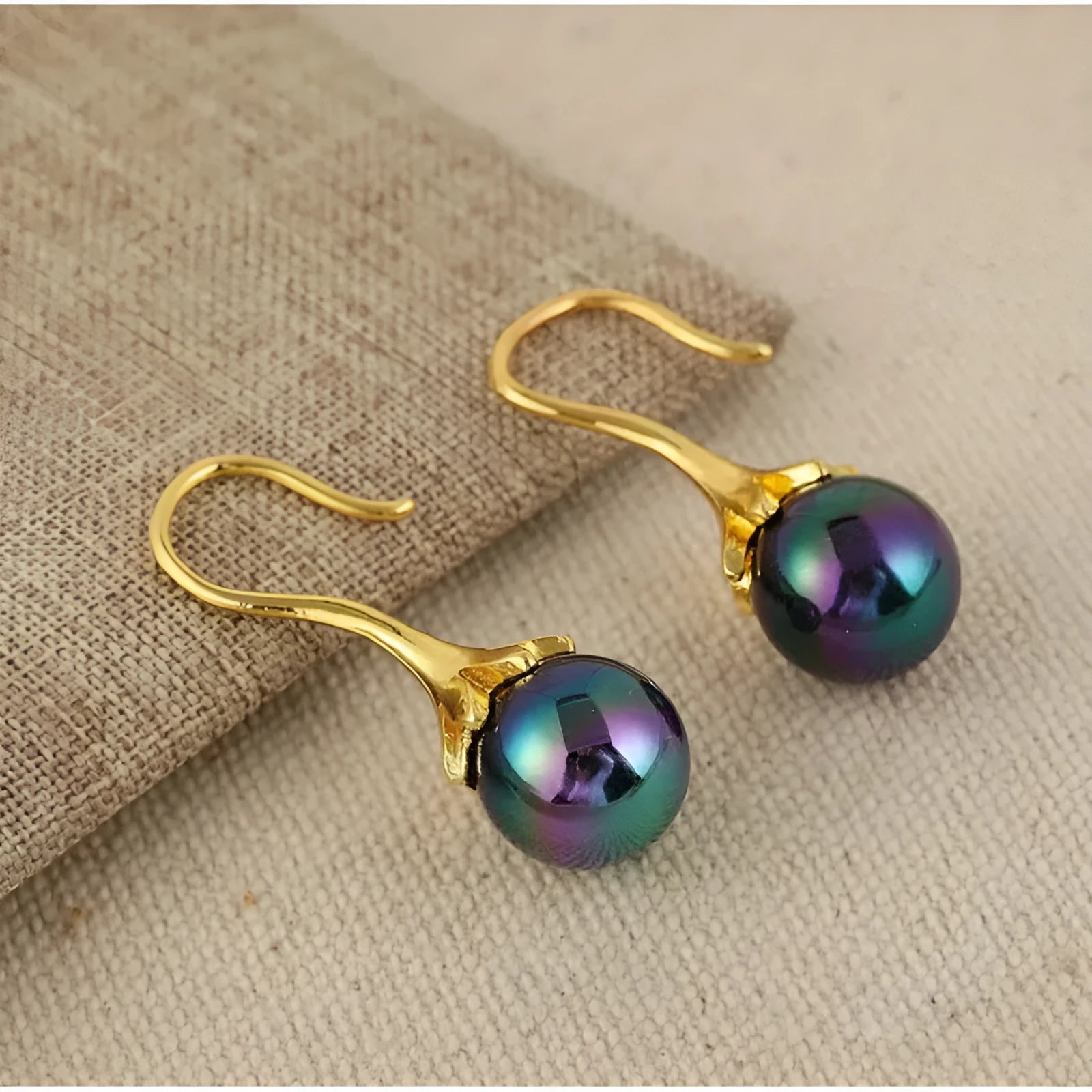 Women's retro fashion earrings with electroplated gold finish and dangly drop design