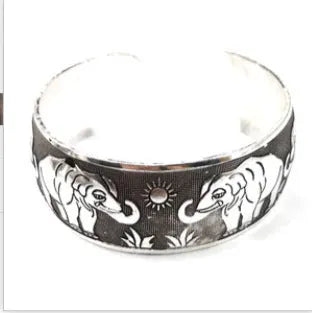 Ethnic style carved open Miao silver bracelet with Roman design on alloy material