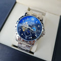 Men's silver case automatic mechanical watch with black starry luminous dial and leather strap.