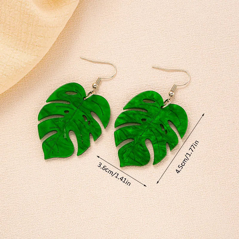 Close-up of acrylic drop earrings with a coconut artocarpus design on alloy hooks, showing one of five colour styles.