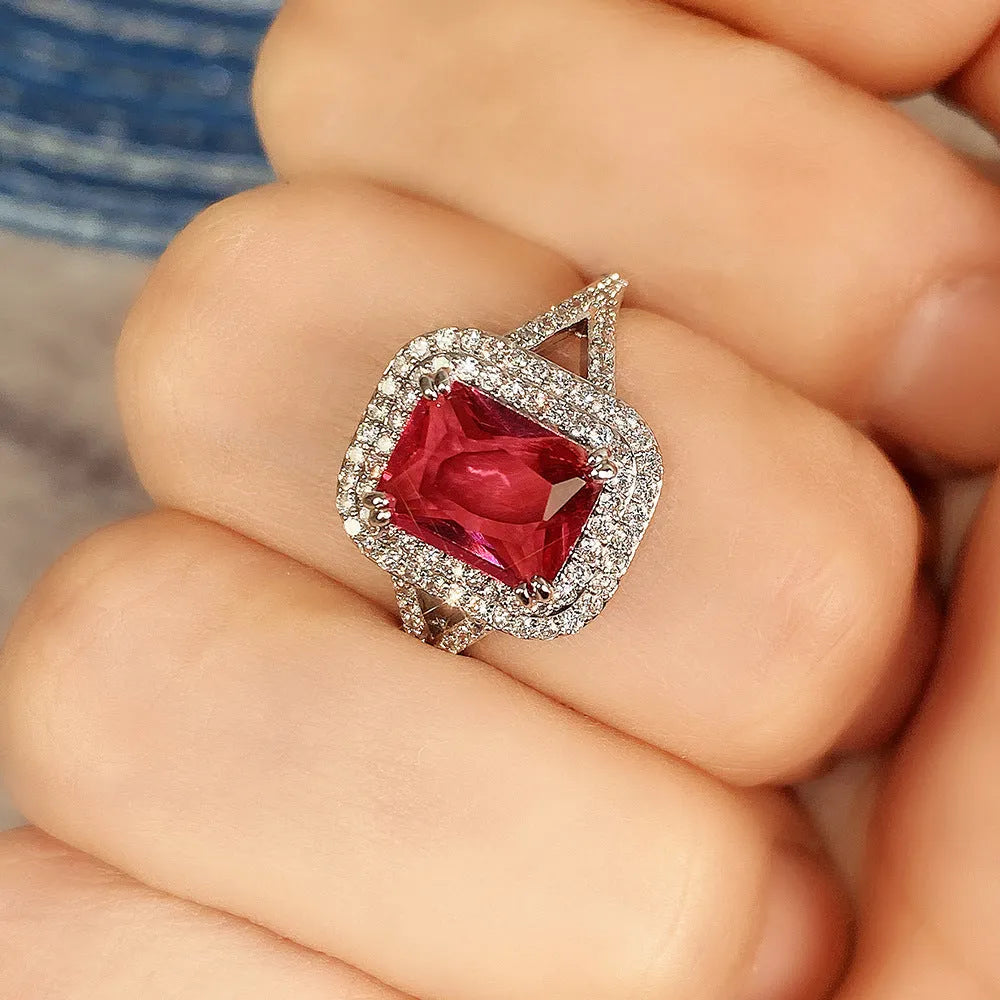 Red copper square women's ring with a geometric shape and central rhinestone decoration.