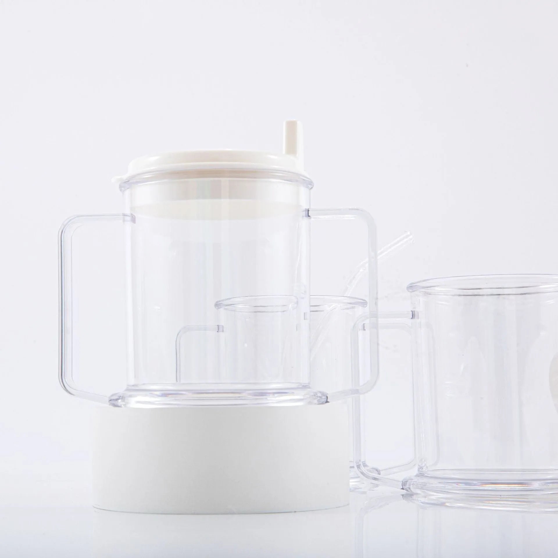 Transparent spill-proof drinking cup showing 14cm height with 301-400ml capacity