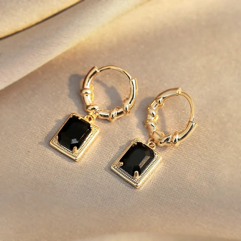 A pair of black geometric quadrilateral copper earrings with a French court retro design.
