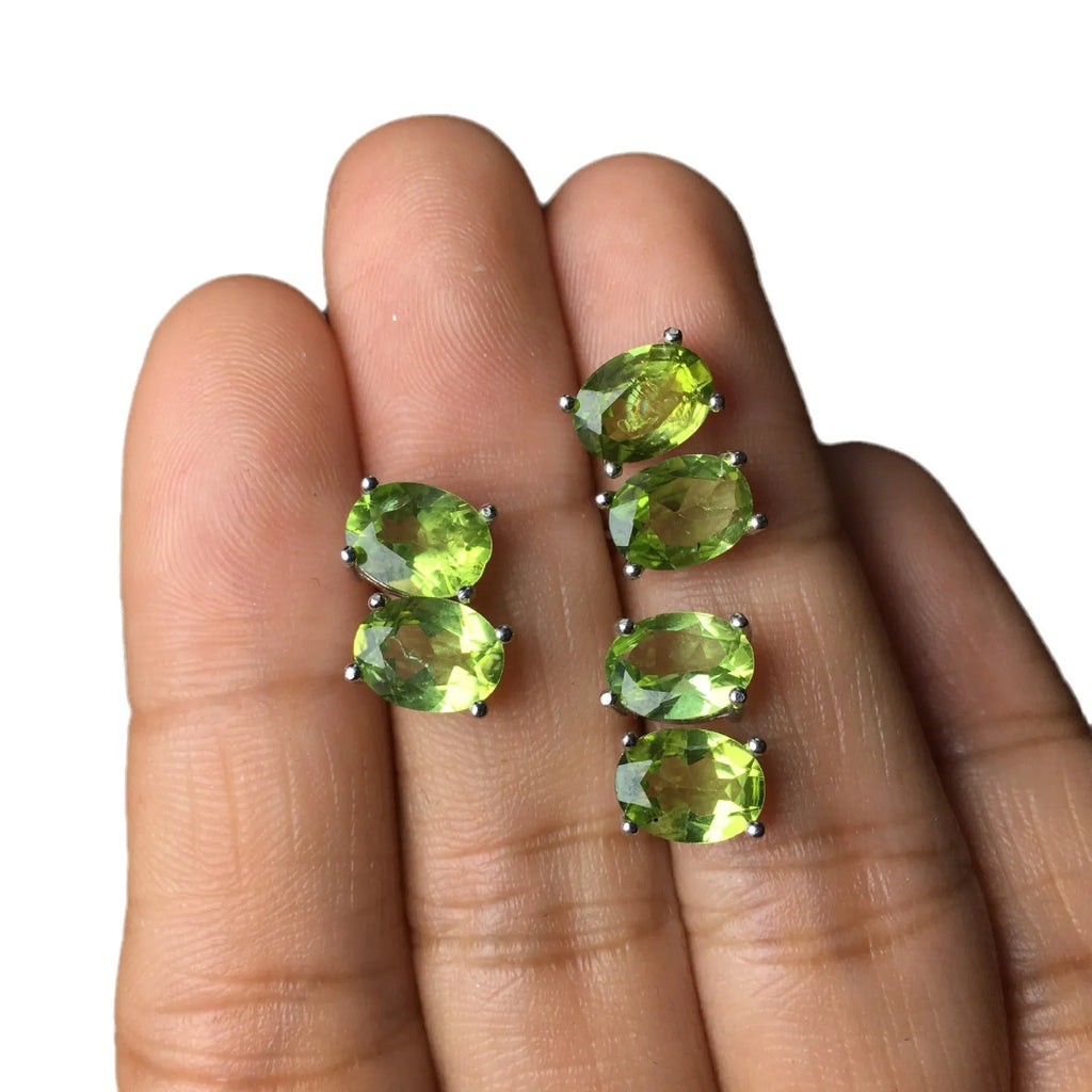 Natural grass green olivine faceted stud earrings in S925 sterling silver setting.