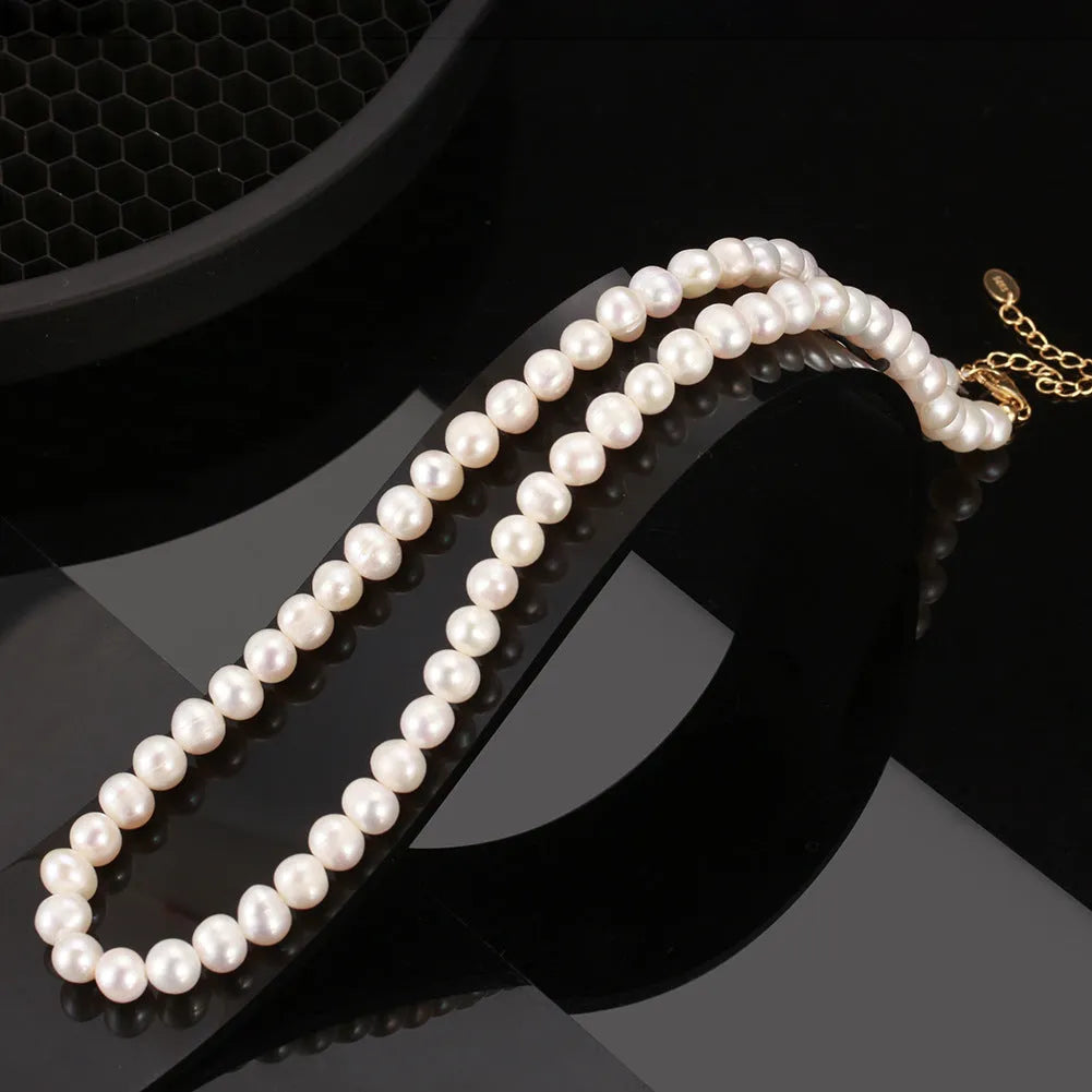 Women's adjustable freshwater pearl necklace with 6-7mm pearls on sterling silver chain