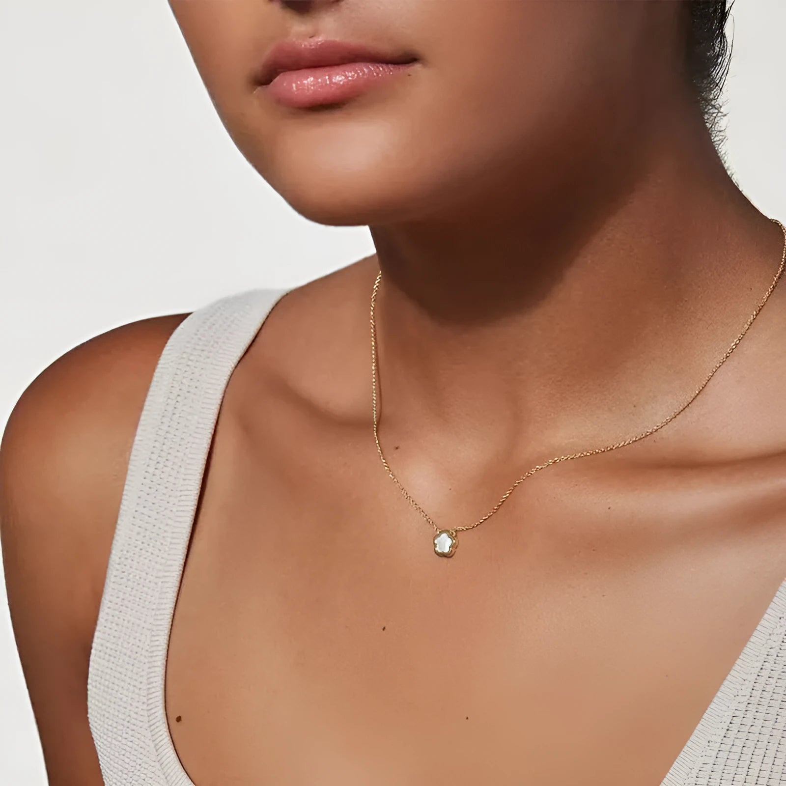 White mother of pearl shell flower necklace on O-shaped chain with gold or silver tone finish