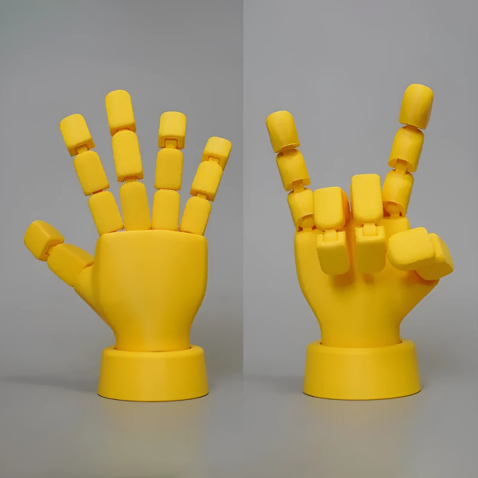 Yellow PLA movable joint hand prop figurine on a white background.