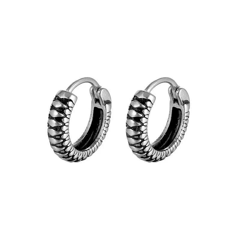 Silver geometric stripe earrings with retro twist design and sports style aesthetic