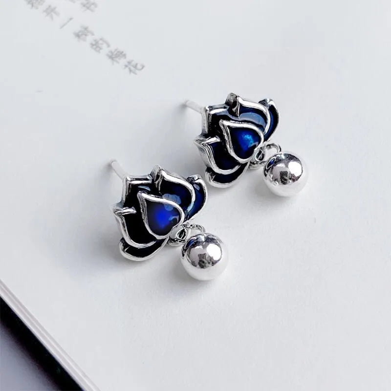Blue lotus earrings with artistic seedpod tassel design, 1.2cm wide ear studs