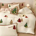 Bright yellow four-piece bedding set with cartoon Christmas tree pattern, fleece-lined for winter warmth