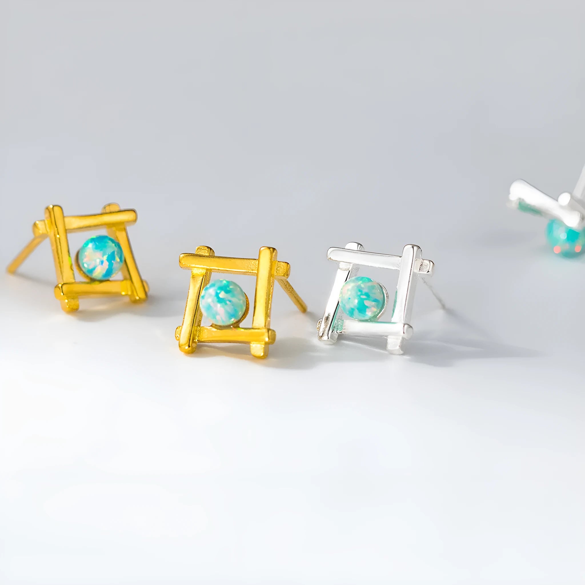 Women's geometric cross quadrangle stud earrings in 925 silver with gold and silver finish options