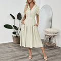 Light green women's twill shirt dress with lapel collar and waist-tight skirt design
