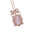 Geometric silver pendant with rose quartz stone and rose gold plating on an alloy chain
