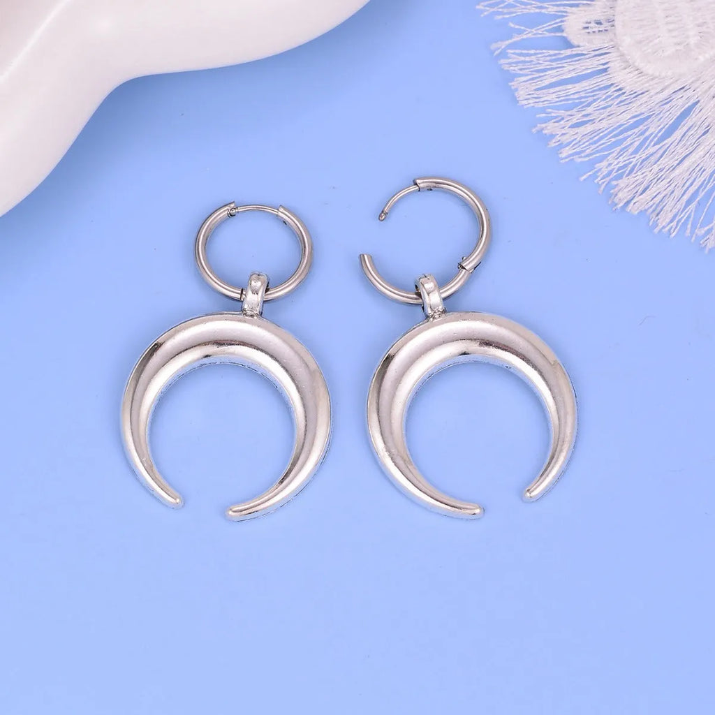 Silver big hoop earrings with vintage gothic moon design and geometric punk style