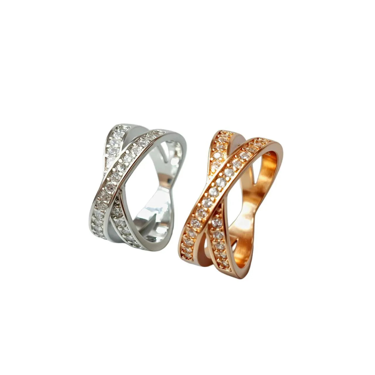 Silver cross ring with micro-inlaid zircon stones and geometric heart design on hand