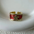 XINGX geometric adjustable copper ring with distressed finish in multiple colours.