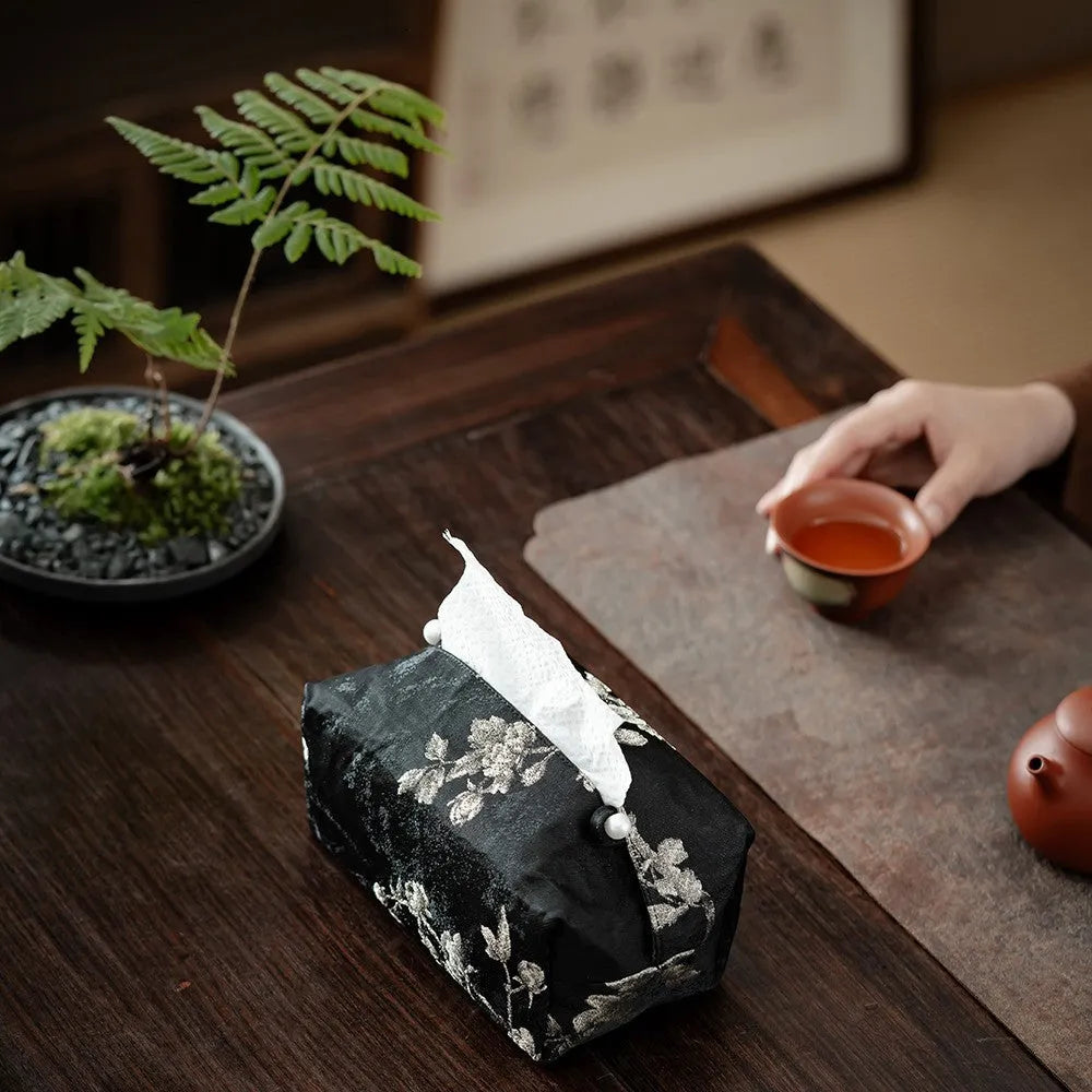 New Chinese brocade fabric tissue box with white plum embroidery, showing pearl buckle variant.