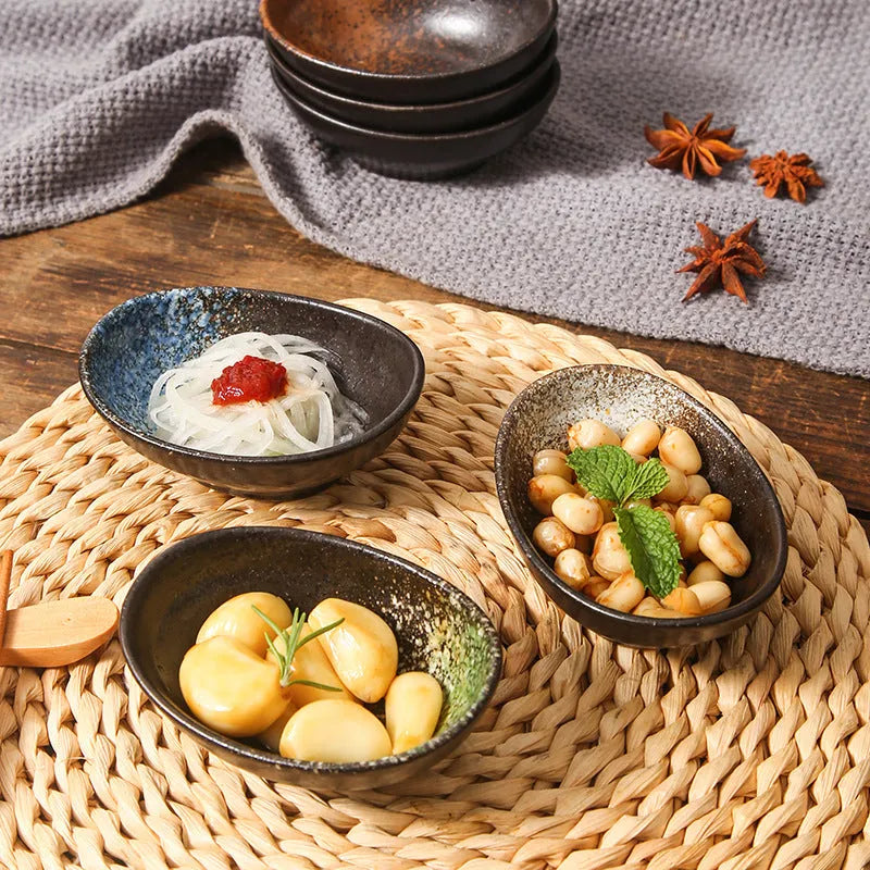 Oval ceramic dipping bowl with Japanese glaze pattern, suitable for microwave use