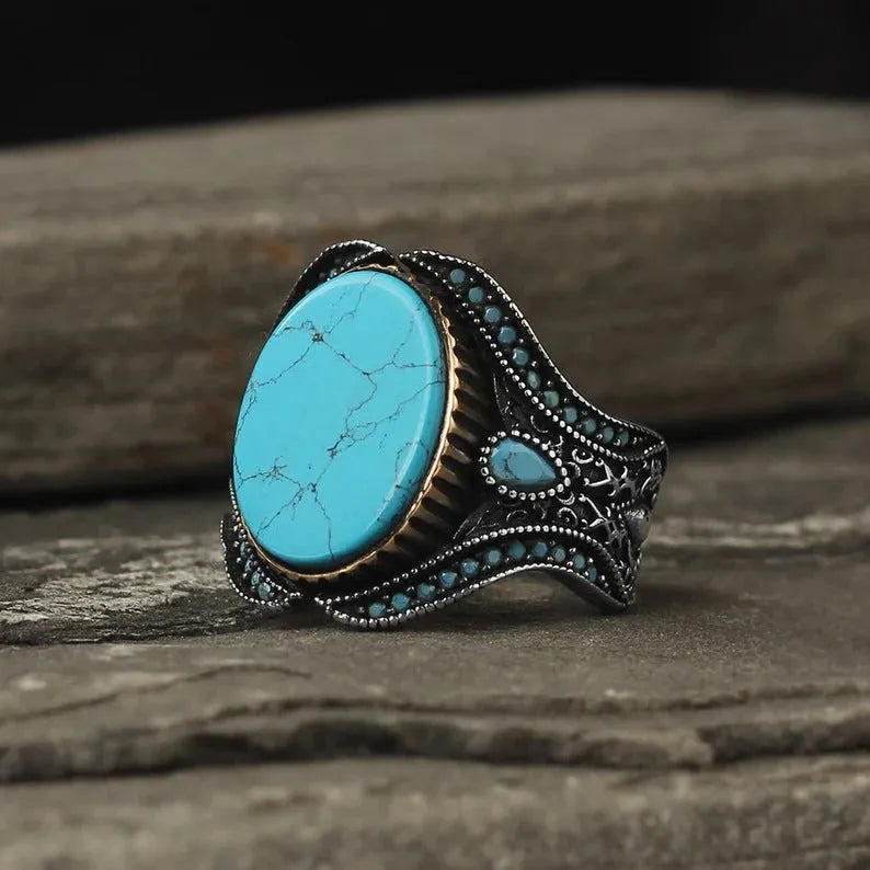 Men's round turquoise ring with antique silver alloy band available in sizes 6 to 13