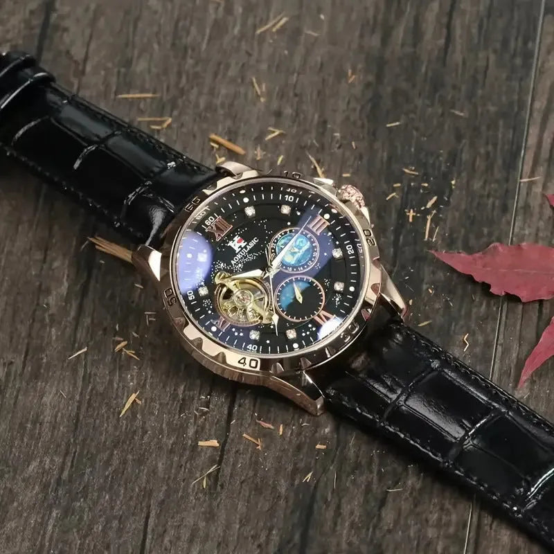 Black and rose gold automatic mechanical watch with hollow dial showing movement through openings
