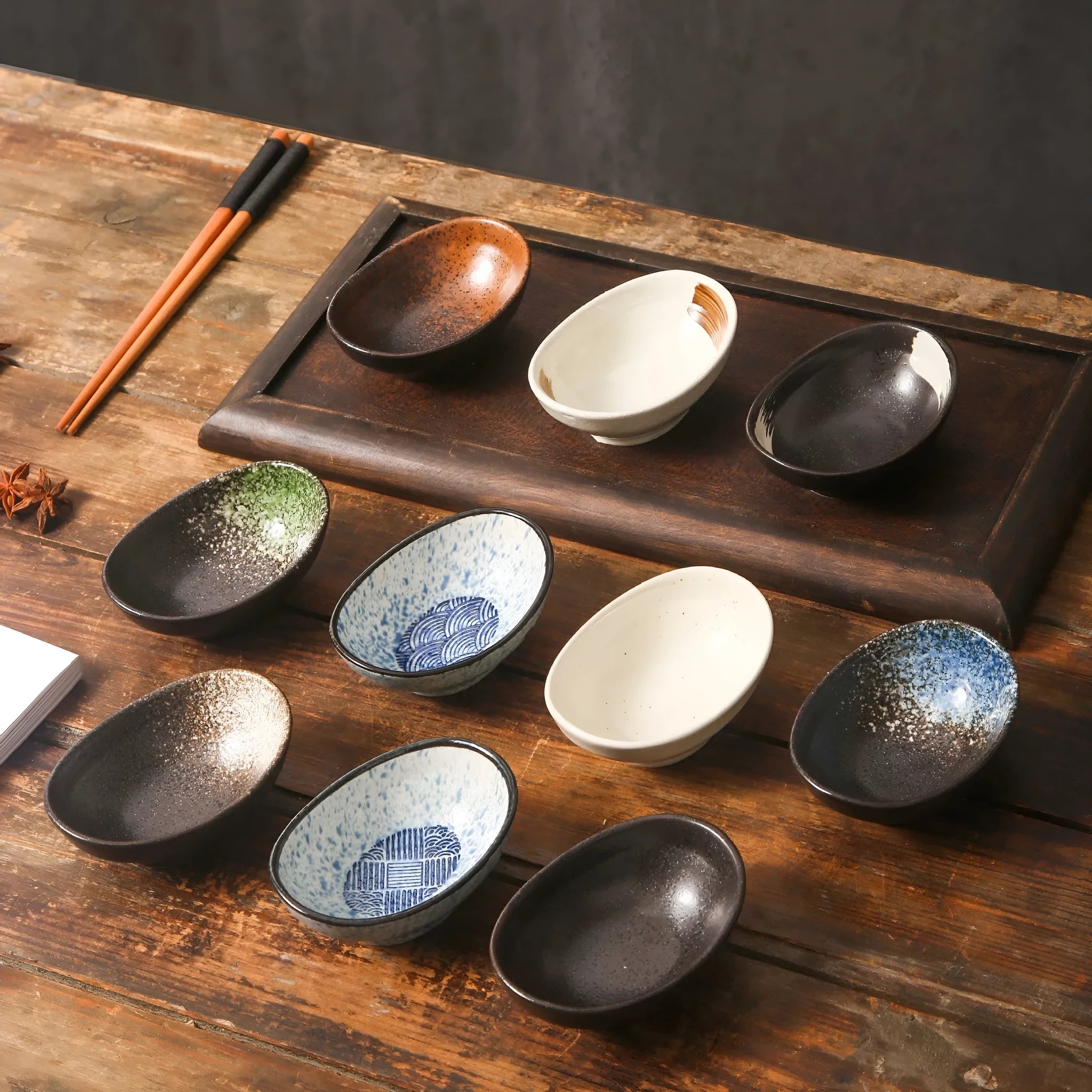 Oval ceramic dipping bowl with Japanese glaze pattern, suitable for microwave use