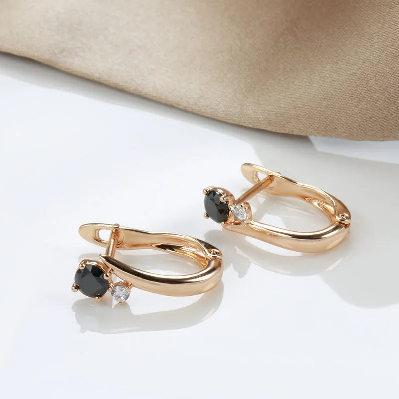 Women's black agate earrings with gold-plated copper construction and drop-shaped retro geometric design
