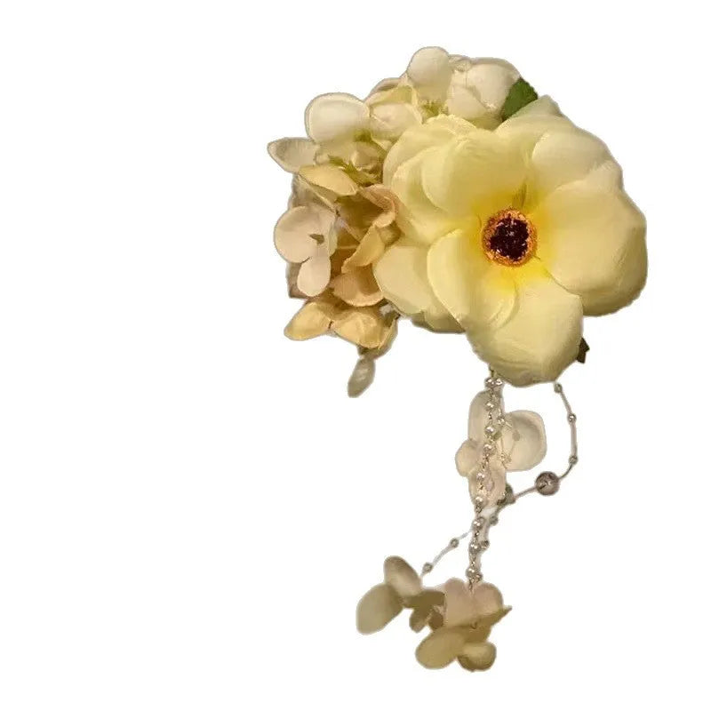 Yellow floral hair clip with pearls and dangling tassels, handmade women's hair accessory