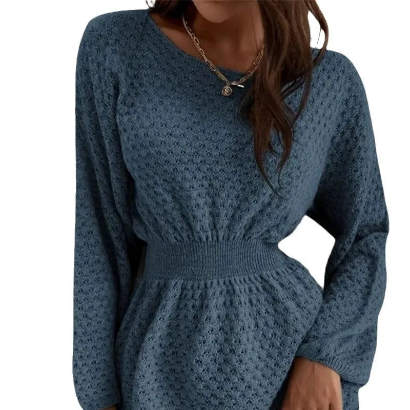 Blue women's knitted dress with crochet flower detail, round neck, and fitted waist