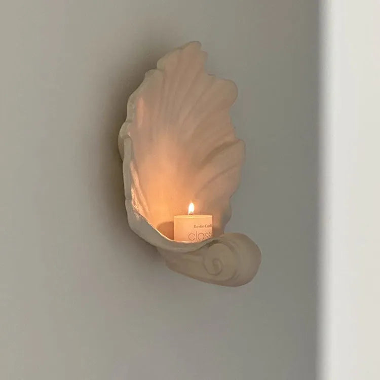 White resin fruit plate decoration with simulation shell design on table setting