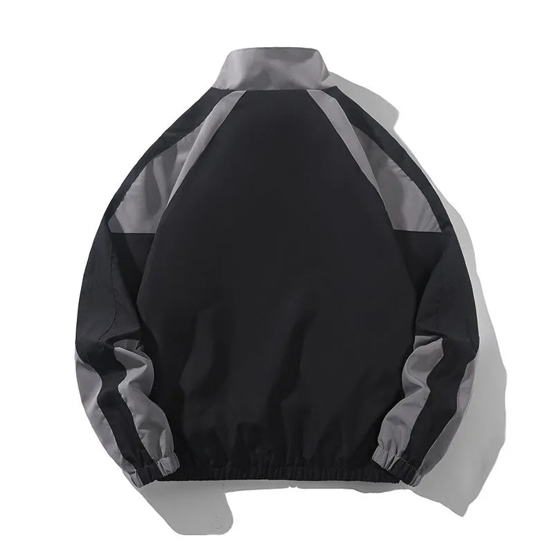 Men's loose fit casual jacket with contrast stitching and side pockets in black or dark blue.