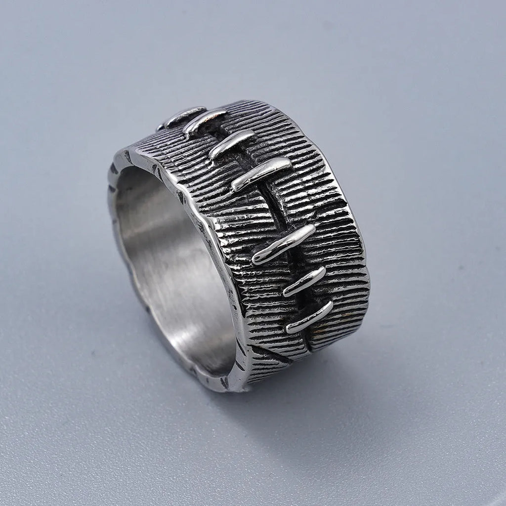 Titanium steel geometric U-shaped double ring with stitched texture in a retro colour.