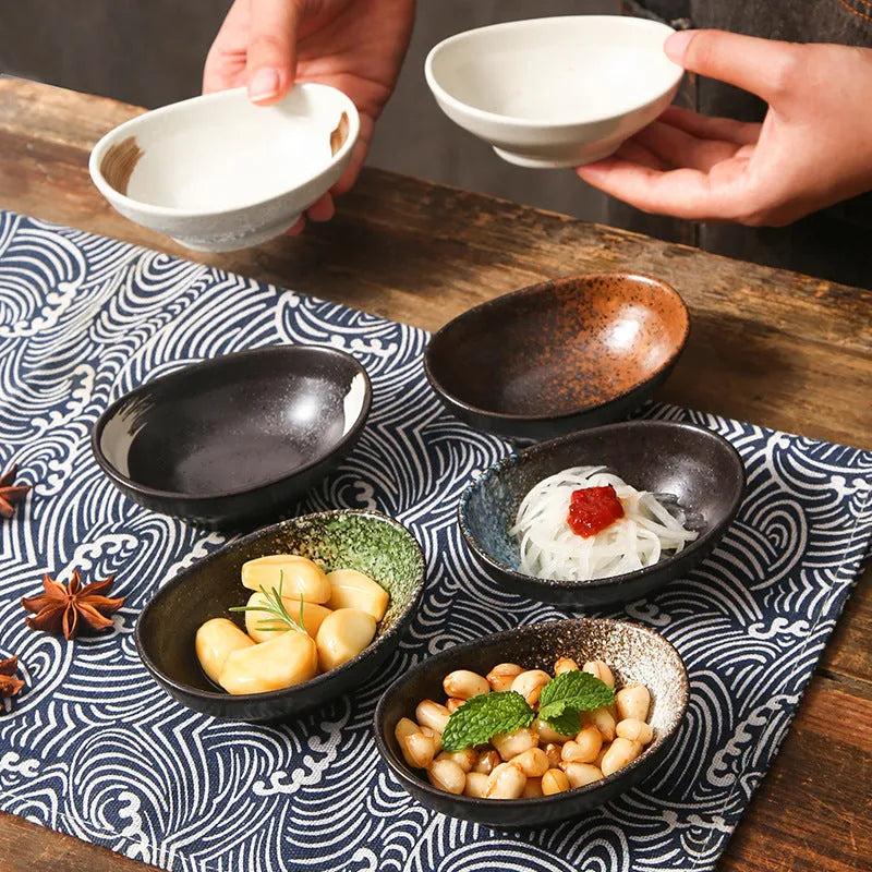 Oval ceramic dipping bowl with Japanese glaze pattern, suitable for microwave use