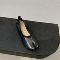 Women's split toe chunky heel pumps in black colour with round toe and low heel