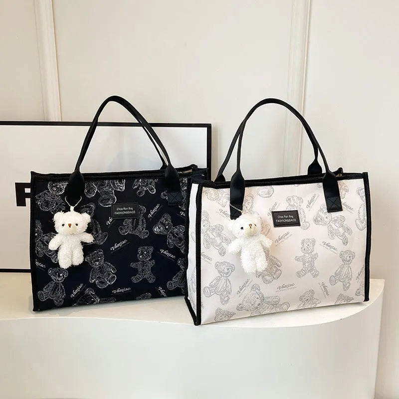 Women's printed canvas tote bag with sandwich pocket and horizontal square shape