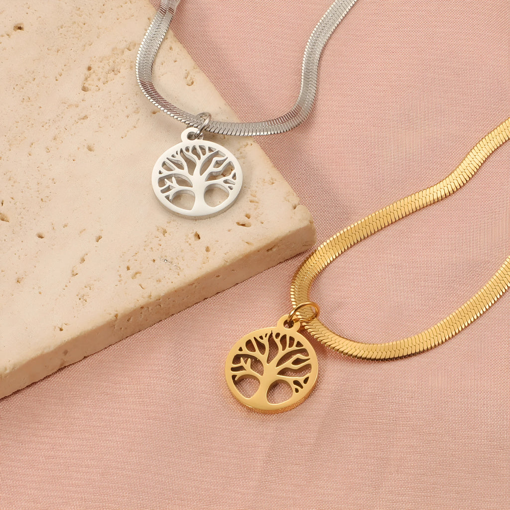 Stainless steel lucky tree necklace on a snake bone chain, showing gold and steel colour options.