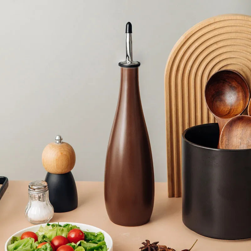 Ceramic oil pot with funnel shape in black, coffee, or white colour for kitchen storage