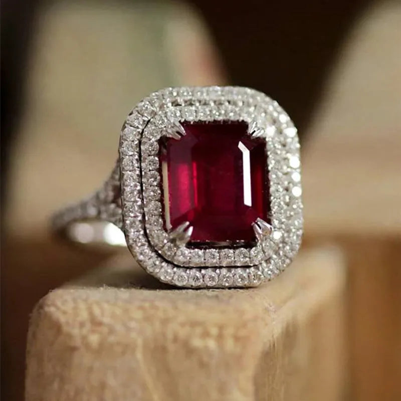 Red copper square women's ring with a geometric shape and central rhinestone decoration.